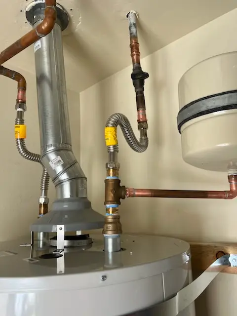 Water heater installation and plumbing repair in Revloc